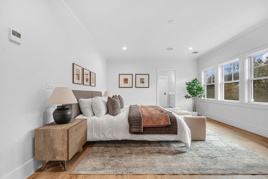 51 Boulder Brook Road Wellesley, MA 02481 - Photo 13 of 39 a spacious bedroom with a bed and glass window
