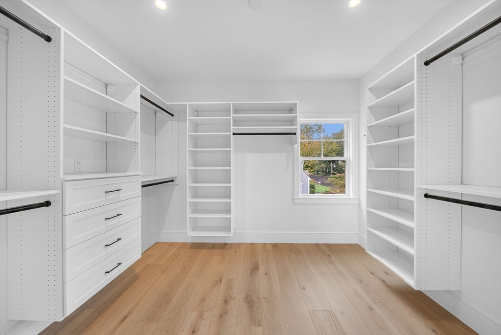 51 Boulder Brook Road Wellesley, MA 02481 - Photo 14 of 39 a view of walk in closet with empty racks