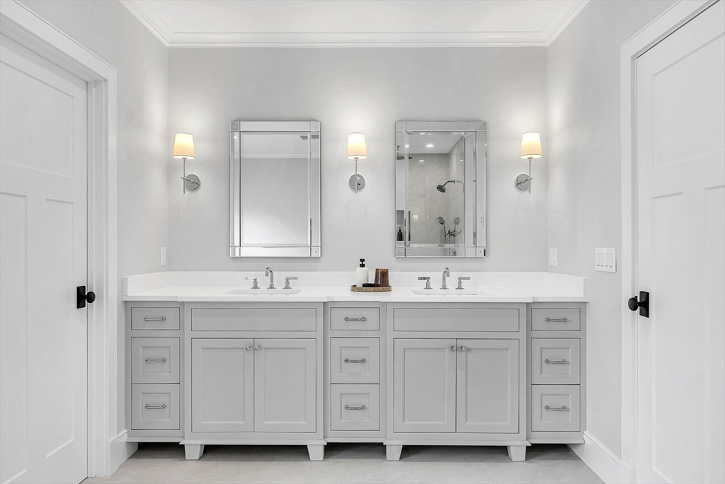 51 Boulder Brook Road Wellesley, MA 02481 - Photo 17 of 39 a bathroom with a granite countertop sink double and mirror