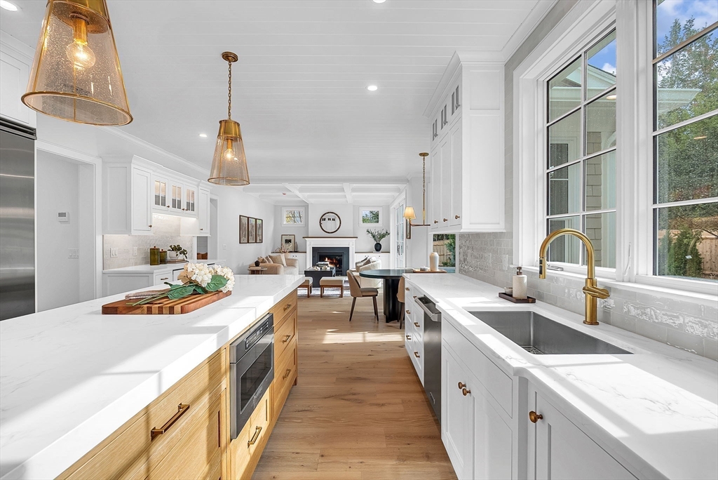51 Boulder Brook Road Wellesley, MA 02481 - Photo 2 of 39 a open kitchen with stainless steel appliances granite countertop a sink and counter space