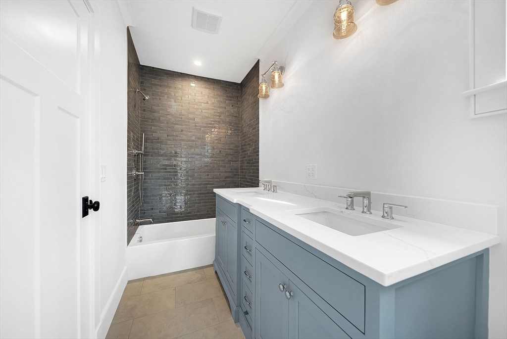 51 Boulder Brook Road Wellesley, MA 02481 - Photo 24 of 39 a bathroom with a sink and a mirror