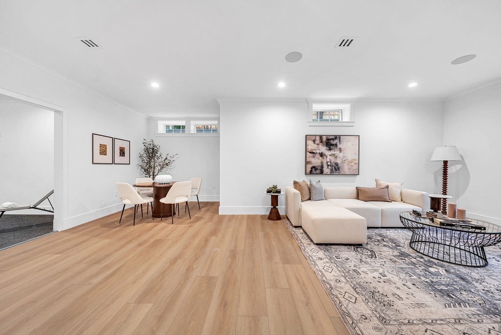 51 Boulder Brook Road Wellesley, MA 02481 - Photo 27 of 39 a bed room with a bed and a chair