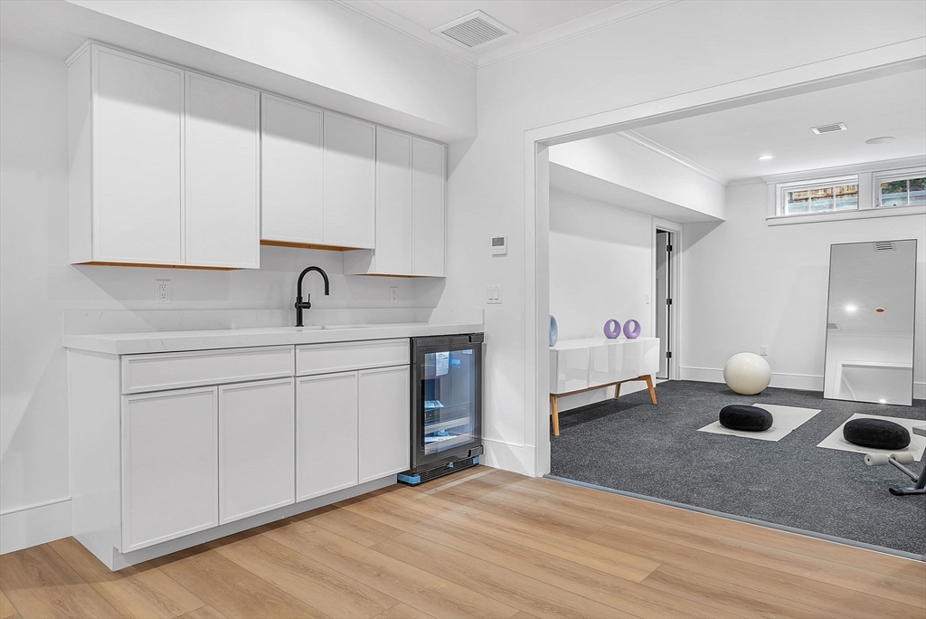 51 Boulder Brook Road Wellesley, MA 02481 - Photo 31 of 39 a kitchen with a sink and a stove