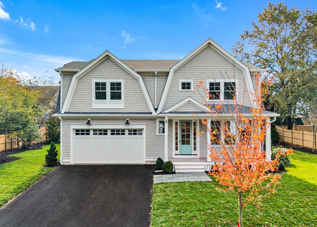 51 Boulder Brook Road Wellesley, MA 02481 - Photo 37 of 39 a front view of a house with garden