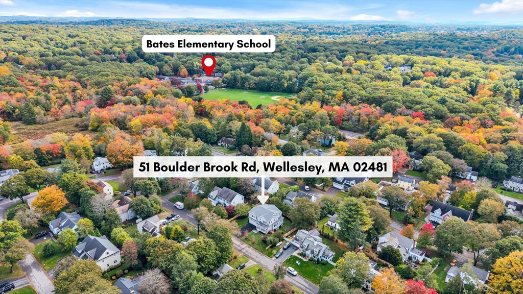 51 Boulder Brook Road Wellesley, MA 02481 - Photo 39 of 39 a sign that is sitting in front of flowers