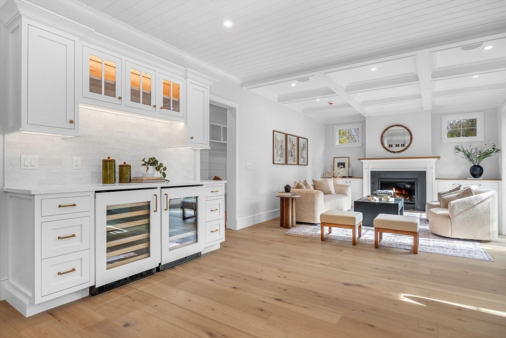 51 Boulder Brook Road Wellesley, MA 02481 - Photo 7 of 39 a living room with furniture and a fireplace