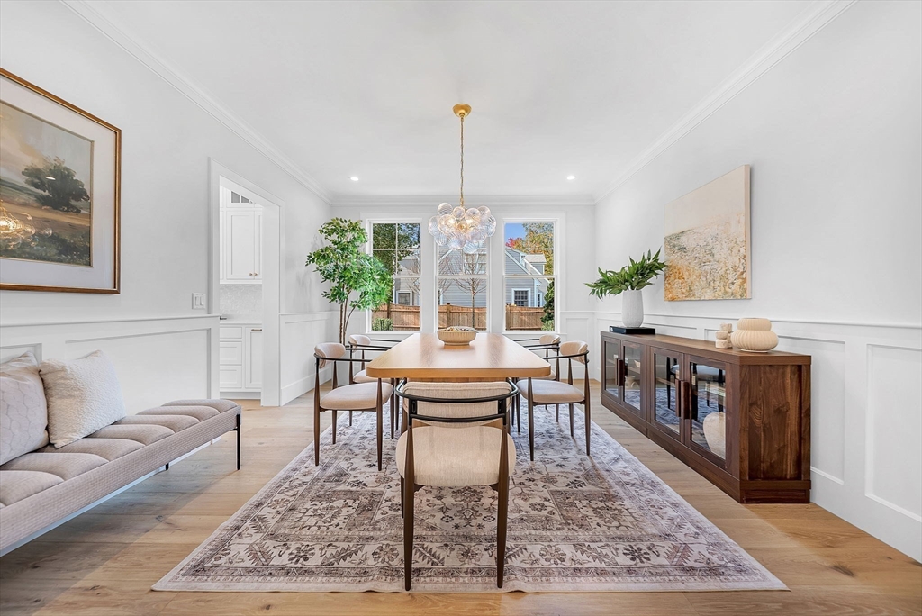 51 Boulder Brook Road Wellesley, MA 02481 - Photo 10 of 39 a living room with furniture a rug and a dining table
