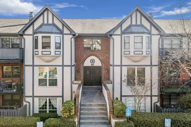 a front view of a house with a porch