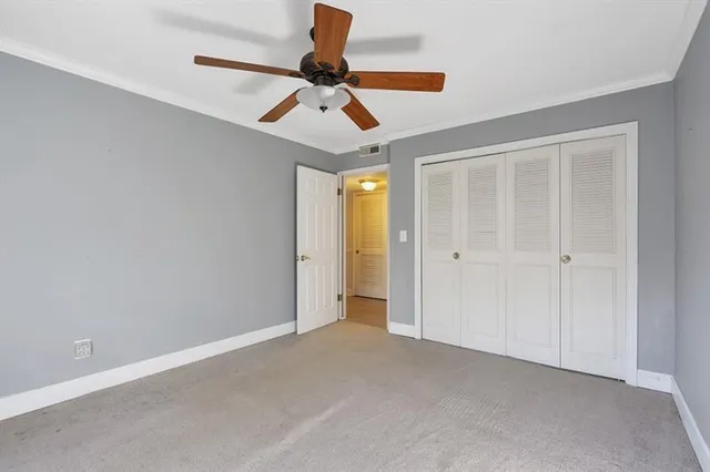 a view of room with ceiling fan