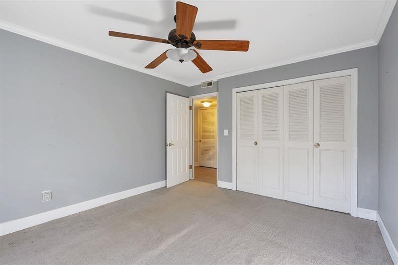 6851 Roswell Road, Unit D14 Atlanta, GA 30328 - Photo 21 of 30 a view of room with ceiling fan