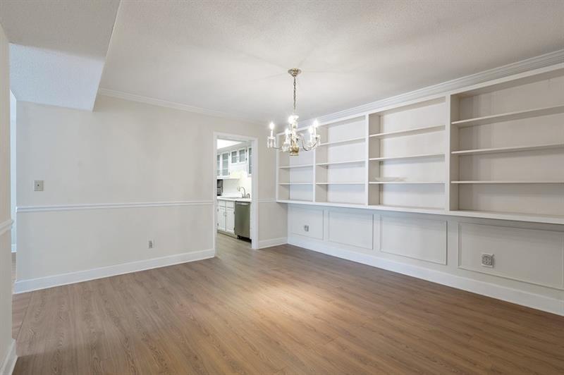 6851 Roswell Road, Unit D14 Atlanta, GA 30328 - Photo 8 of 30 a view of an empty room with a window