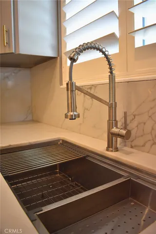 a view of a sink and an oven