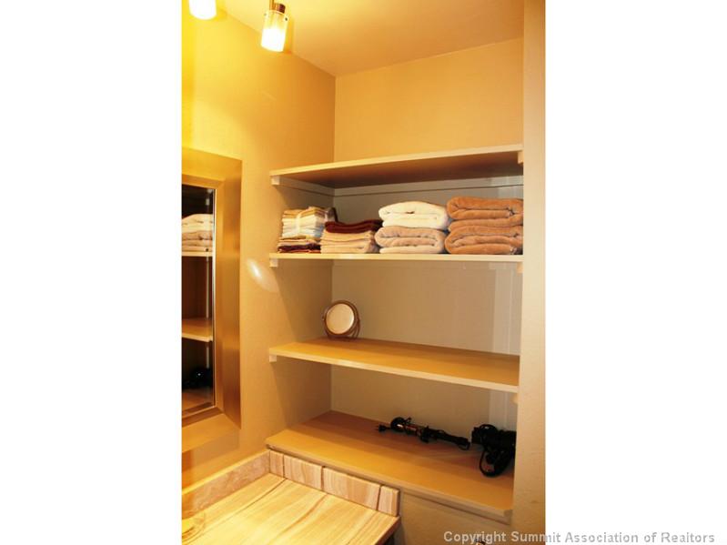 70 Evergreen Road, Unit 305 Dillon, CO 80435 - Photo 20 of 21 Bathroom. Built in shelving next to the sink