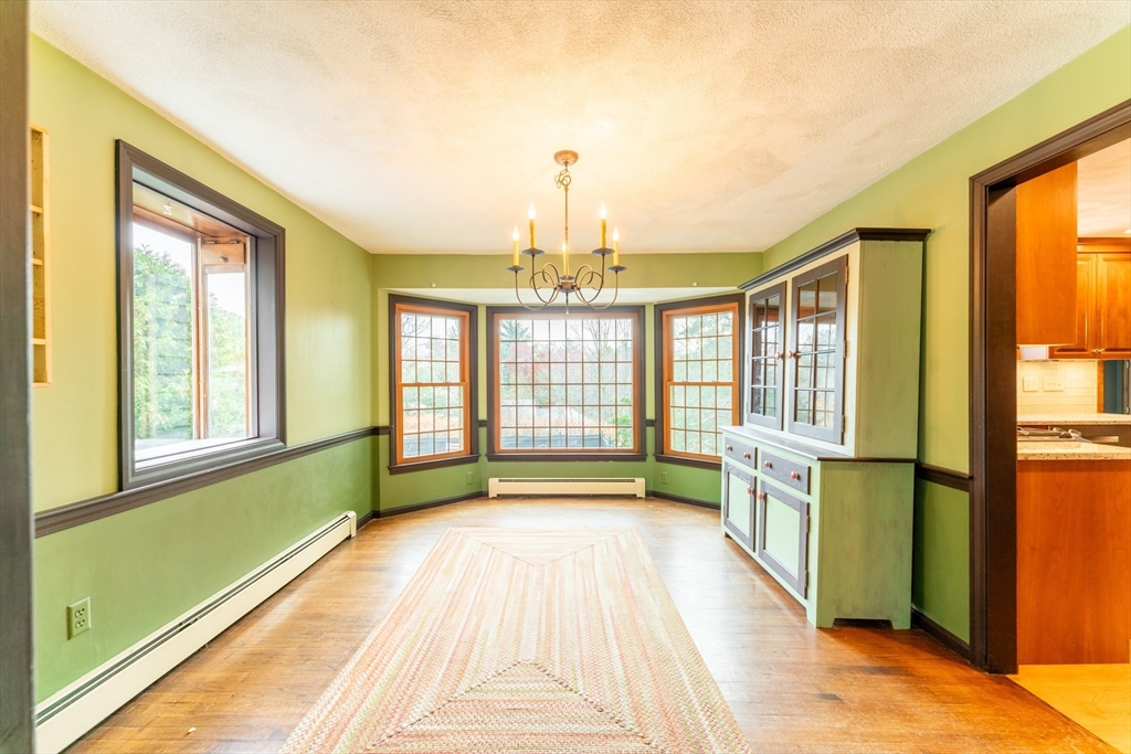 375 Winter Street Walpole, MA 02081 - Photo 21 of 40 a view of an empty room with a window
