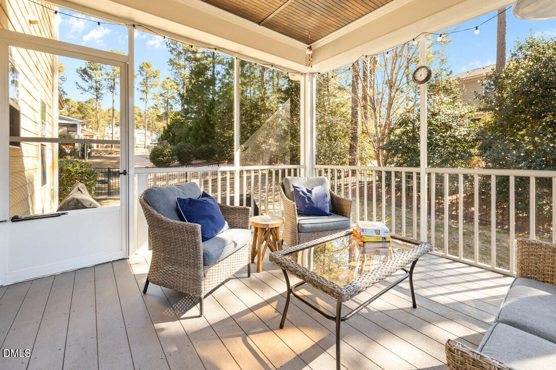 170 Valley Pines Circle Spring Lake, NC 28390 - Photo 26 of 55 a balcony with wooden floor and outdoor seating