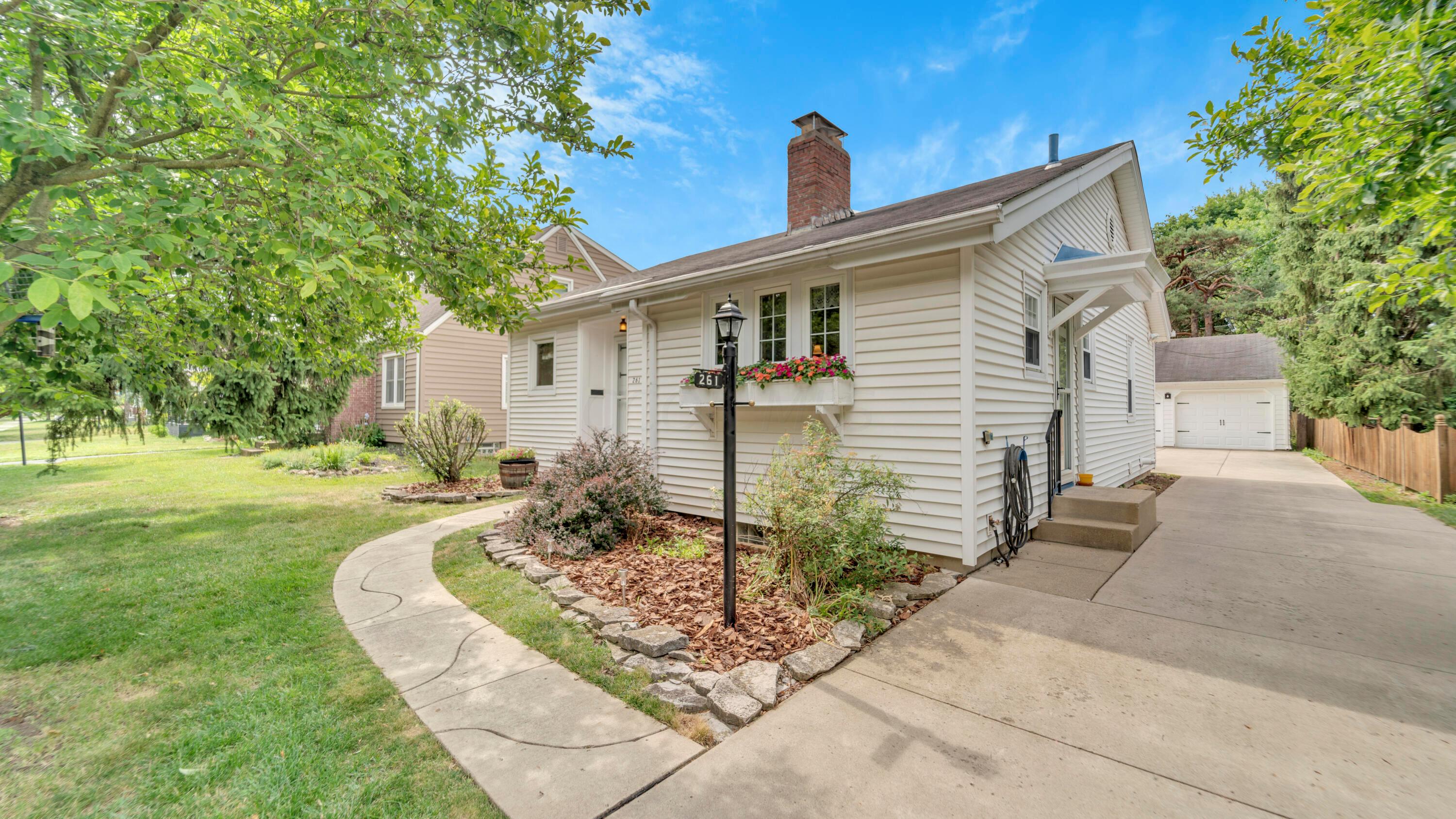 Front angled with Driveway and Garage
