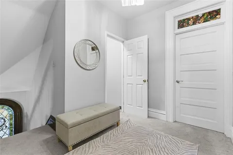 a view of entryway with wooden floor