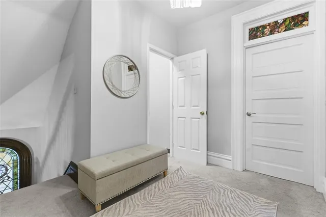 a view of entryway with wooden floor