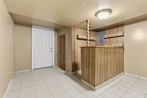 a bathroom with a sink toilet and mirror