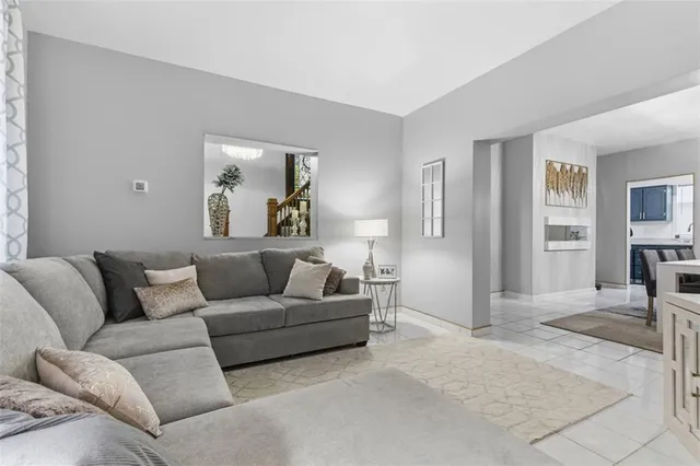 a living room with furniture and a couch