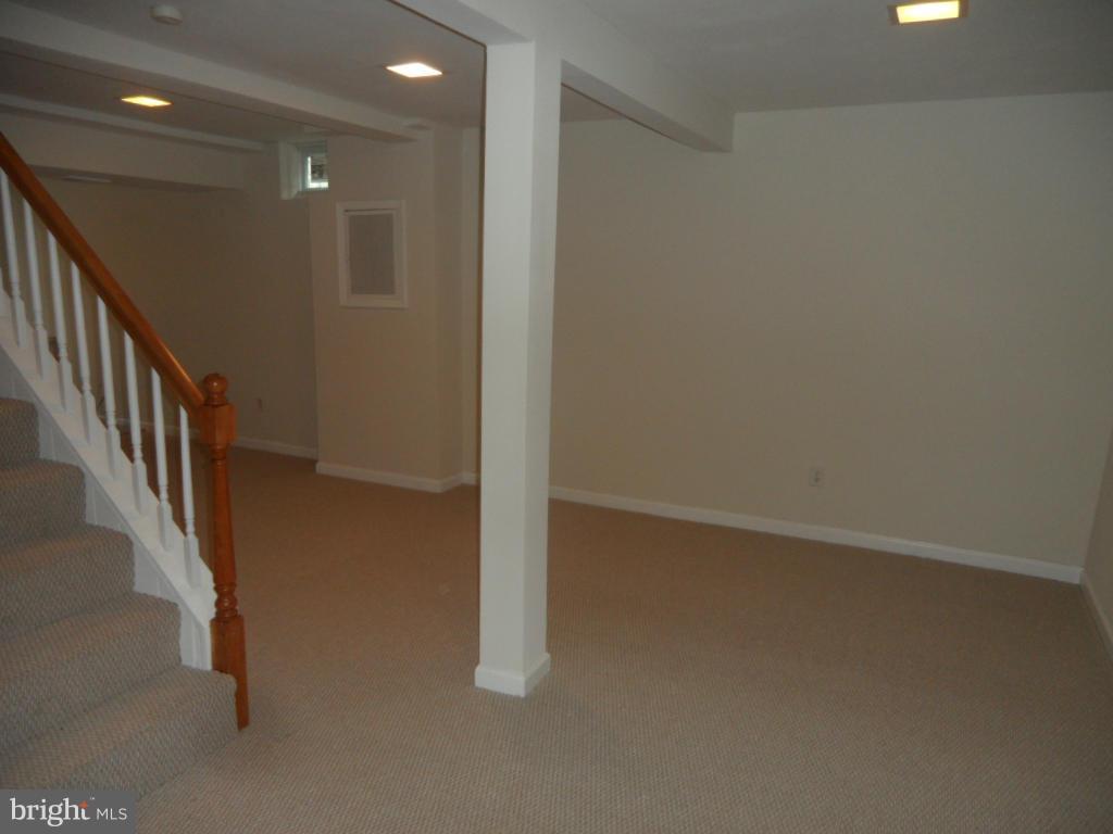 7855 Burnside Road Landover, MD 20785 - Photo 11 of 17 a view of hallway with stairs