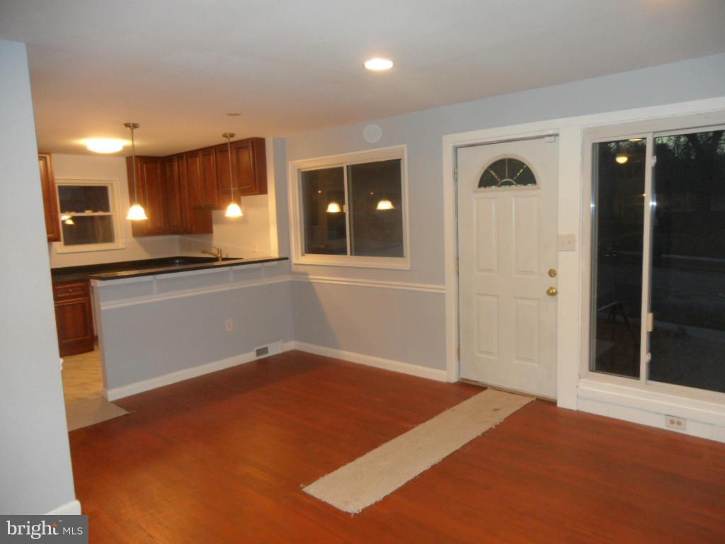7855 Burnside Road Landover, MD 20785 - Photo 4 of 17 a view of a kitchen with a sink and cabinets