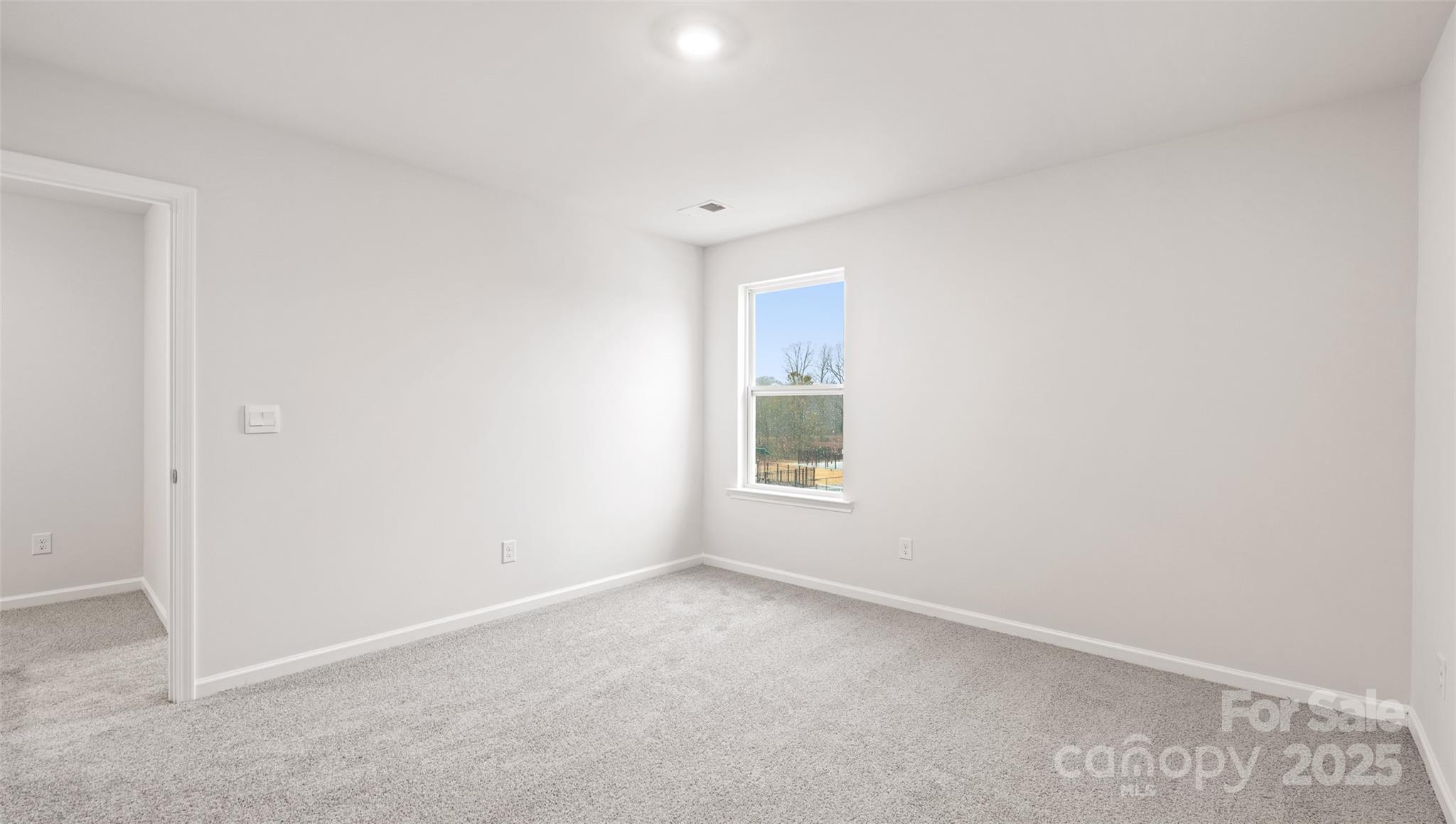 52 Shorthorn Road Fletcher, NC 28732 - Photo 12 of 28 an empty room with a window