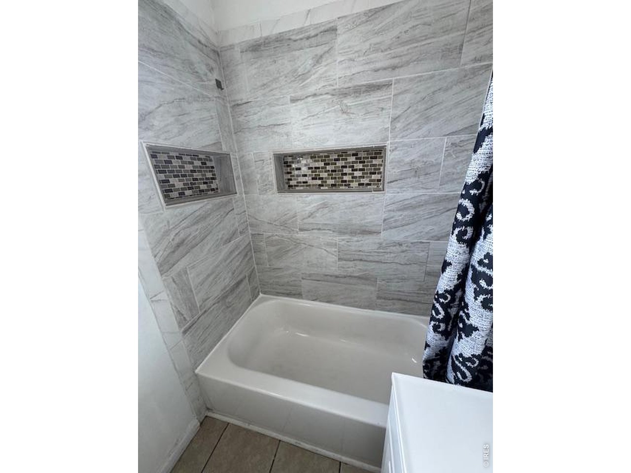 818 4th Street Greeley, CO 80631 - Photo 8 of 11 Beautiful updated tub enclosure