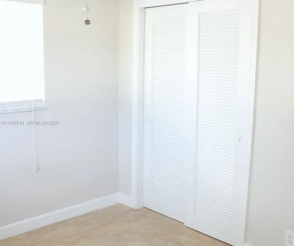 a view of a small space with closet