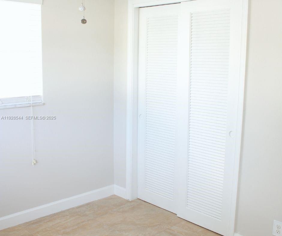 5709 Northwest 64th Way Tamarac, FL 33321 - Photo 20 of 51 a view of a small space with closet