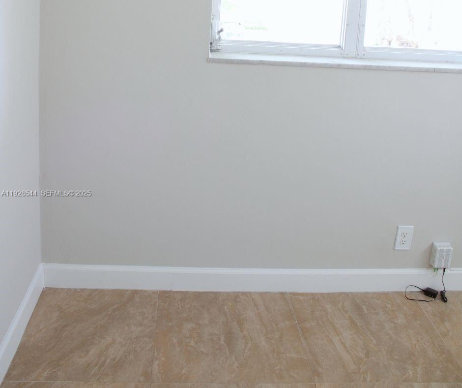 5709 Northwest 64th Way Tamarac, FL 33321 - Photo 27 of 51 a view of a small space