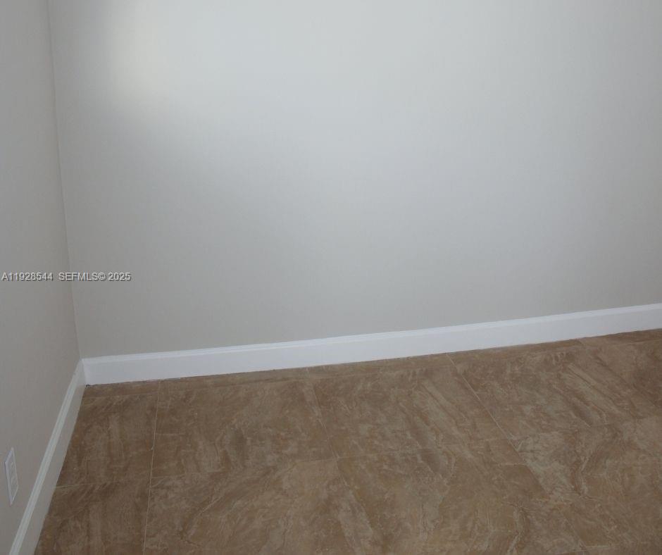 5709 Northwest 64th Way Tamarac, FL 33321 - Photo 31 of 51 a view of an empty room
