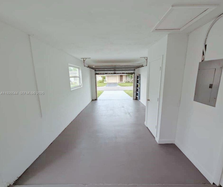 5709 Northwest 64th Way Tamarac, FL 33321 - Photo 40 of 51 a view of a room with window