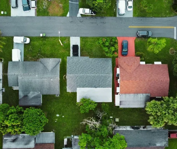 a view of a yard with an outdoor space