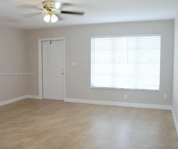 an empty room with a window