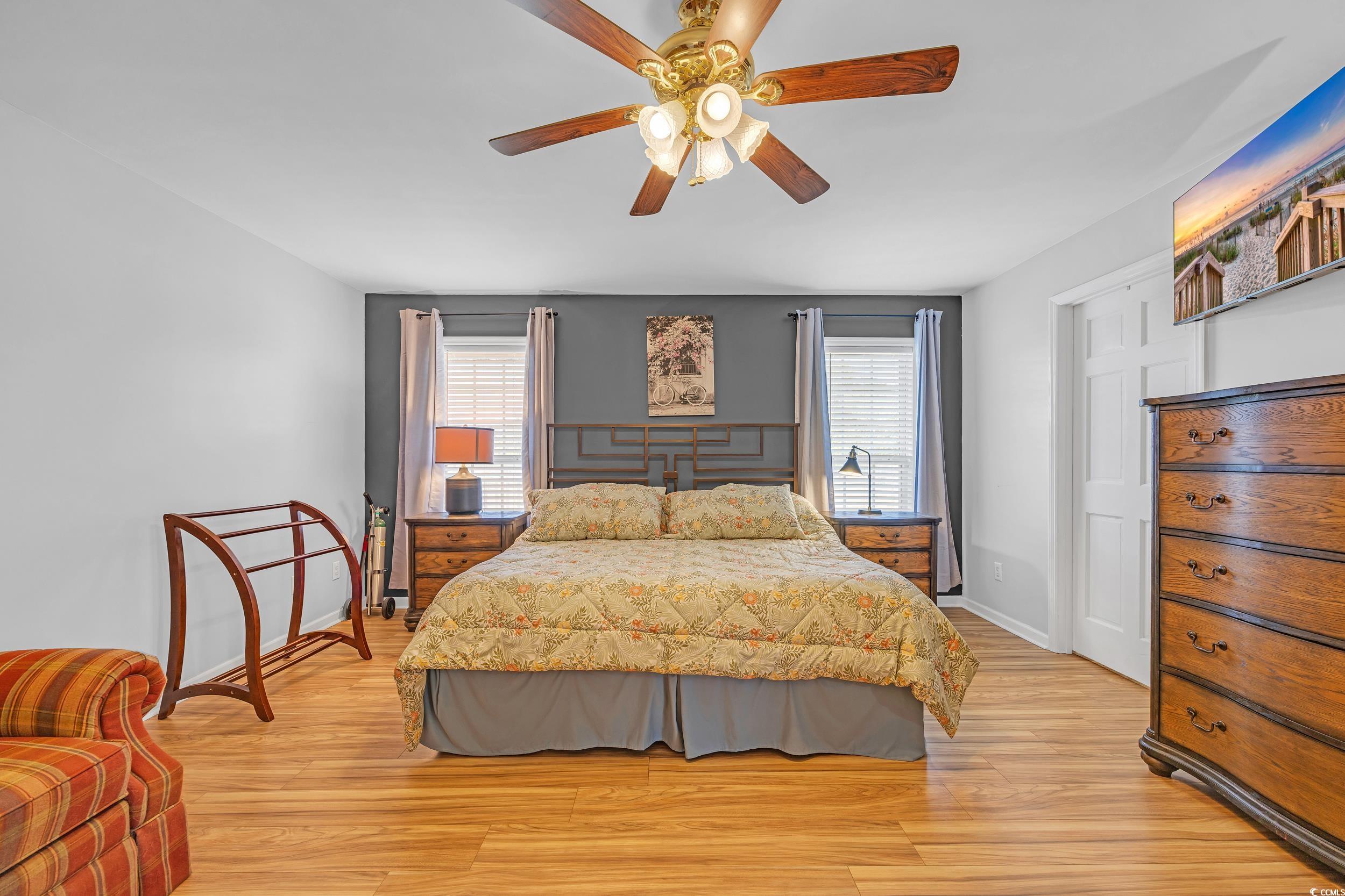 1014 Academy Drive Conway, SC 29526 - Photo 11 of 40 Bedroom featuring ceiling fan, baseboards, and lig