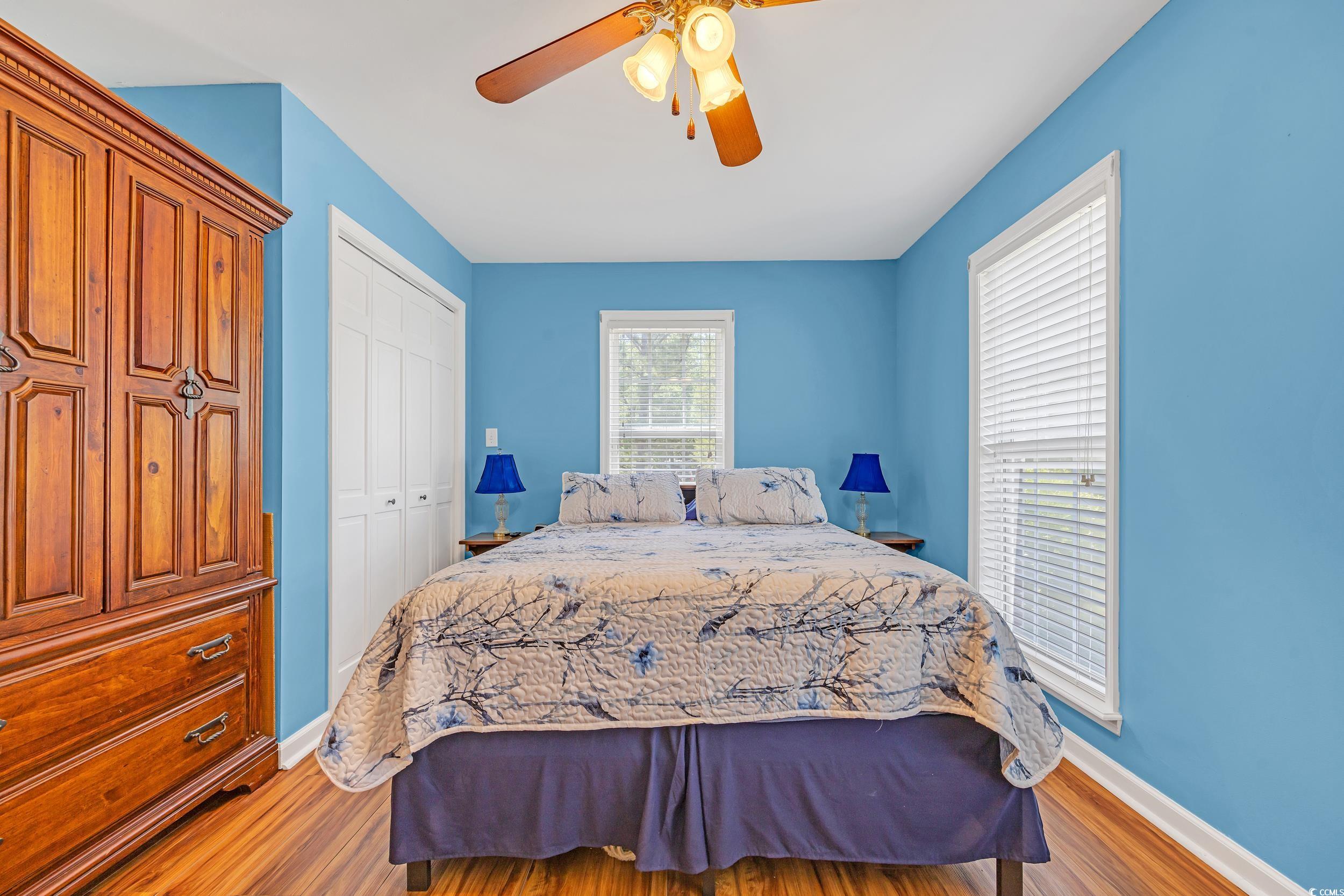 1014 Academy Drive Conway, SC 29526 - Photo 16 of 40 Bedroom with a closet, baseboards, ceiling fan, an