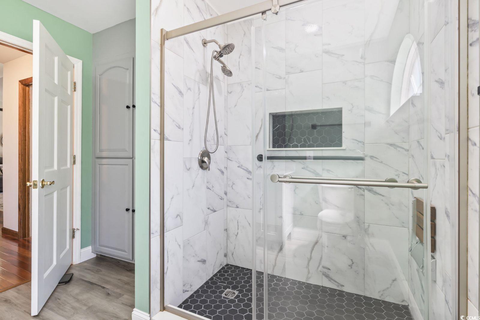 1014 Academy Drive Conway, SC 29526 - Photo 18 of 40 Bathroom with a marble finish shower, baseboards,