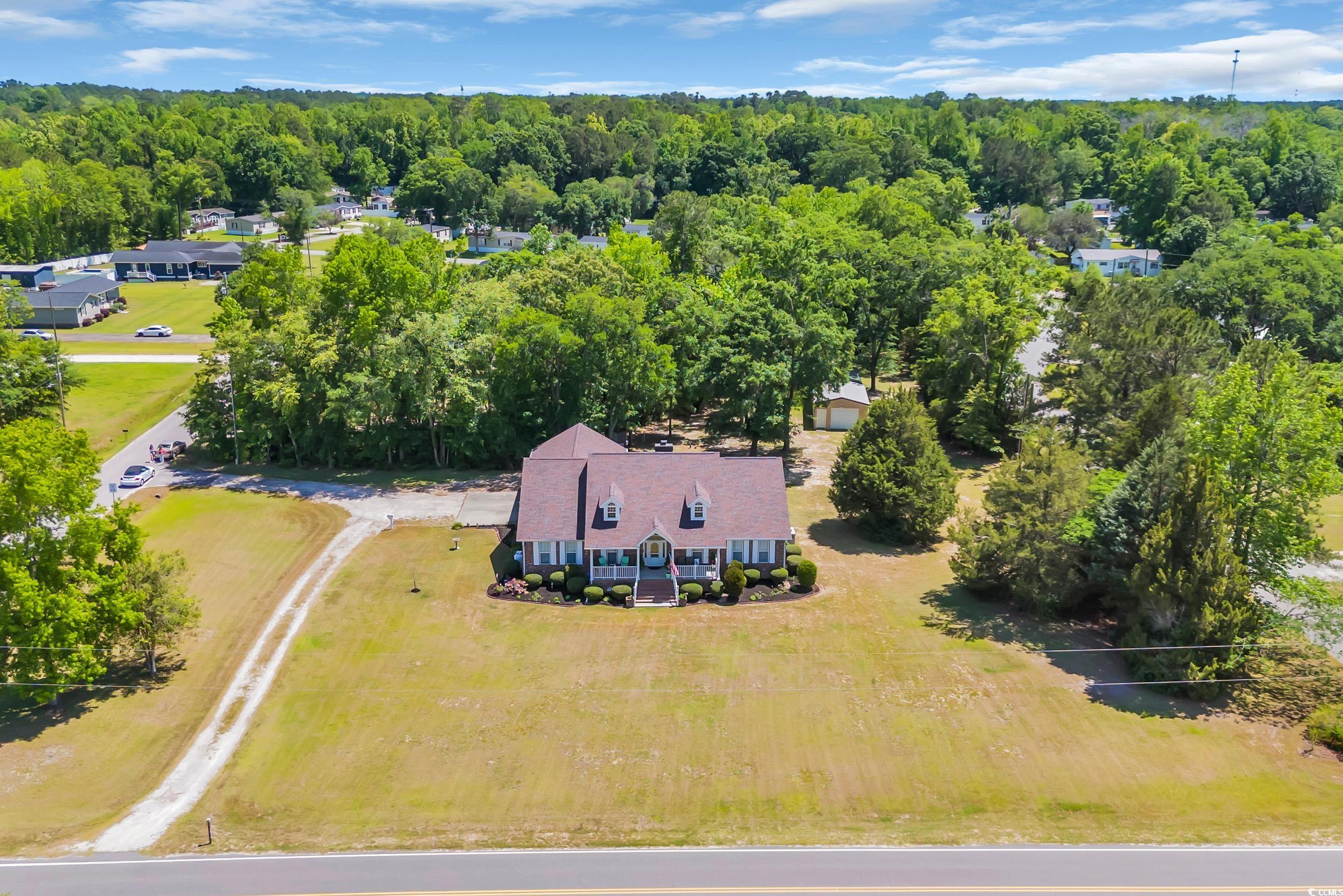 1014 Academy Drive Conway, SC 29526 - Photo 2 of 40 Birds eye view of property with a wooded view