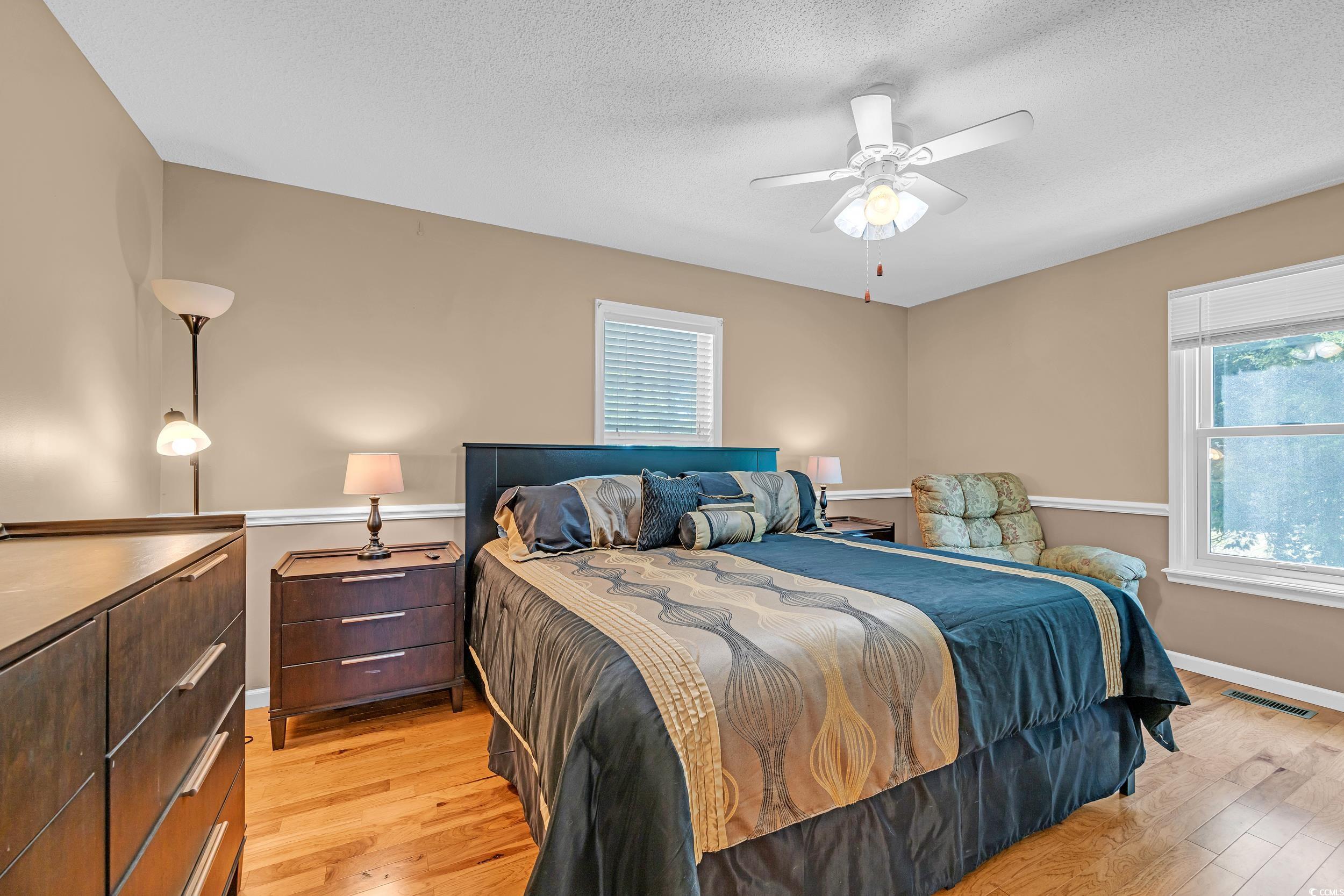 1014 Academy Drive Conway, SC 29526 - Photo 21 of 40 Bedroom featuring a textured ceiling, baseboards,