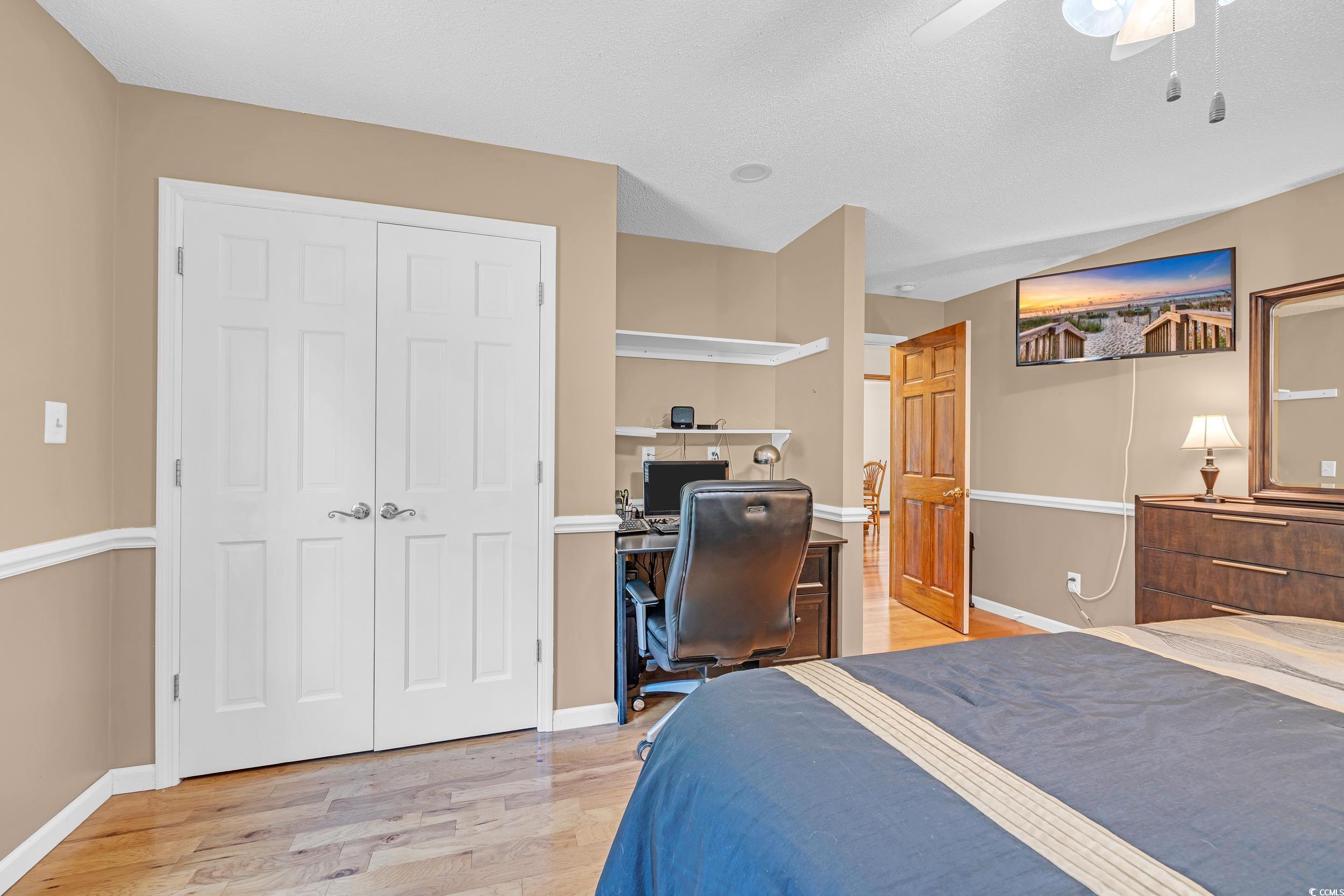 1014 Academy Drive Conway, SC 29526 - Photo 22 of 40 Bedroom featuring a ceiling fan, baseboards, and l