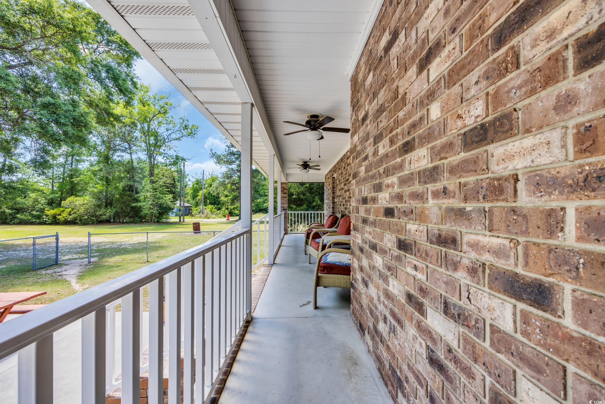1014 Academy Drive Conway, SC 29526 - Photo 23 of 40 View of patio / terrace with a ceiling fan and a p