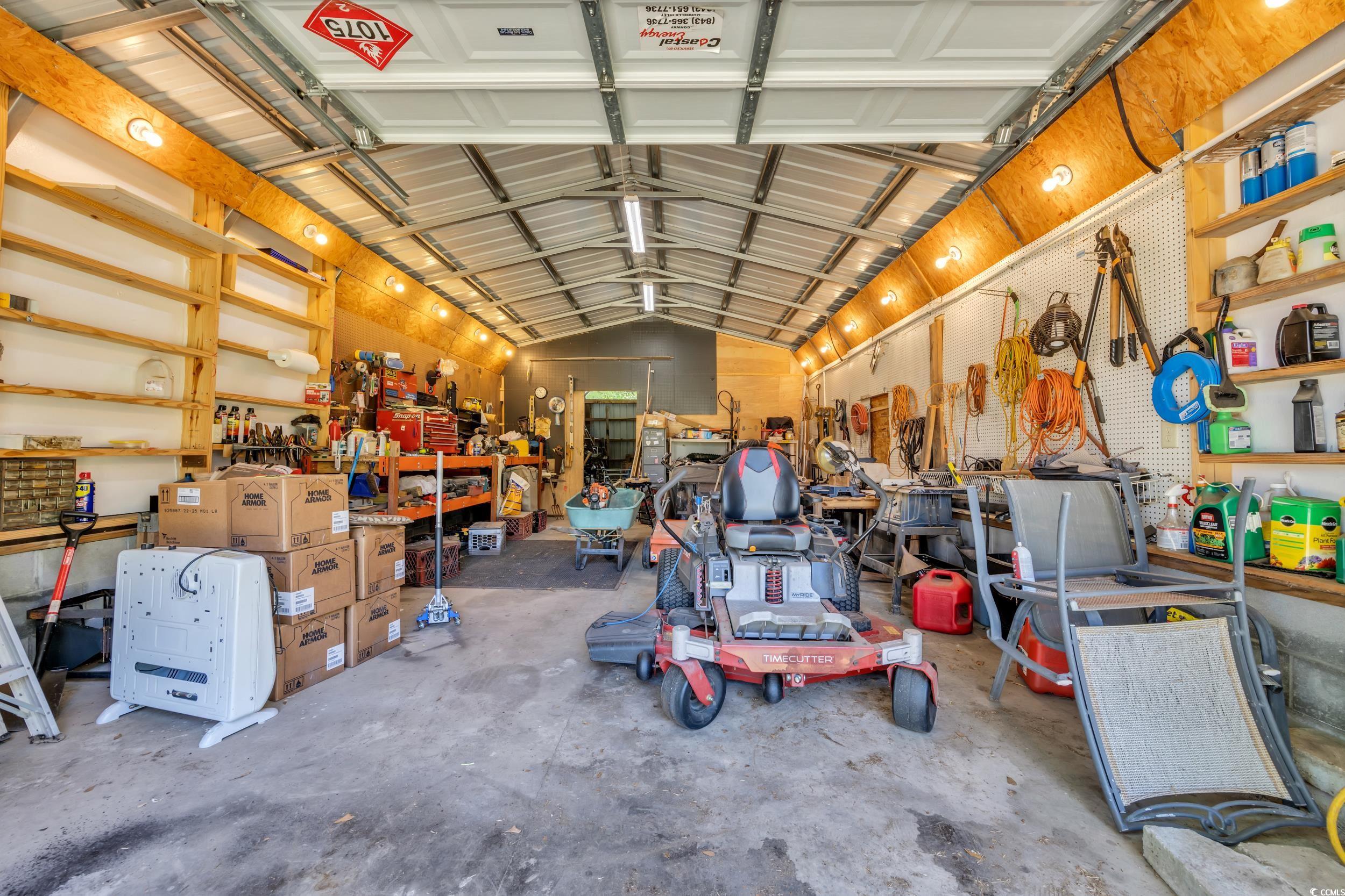 1014 Academy Drive Conway, SC 29526 - Photo 26 of 40 Garage featuring a workshop area