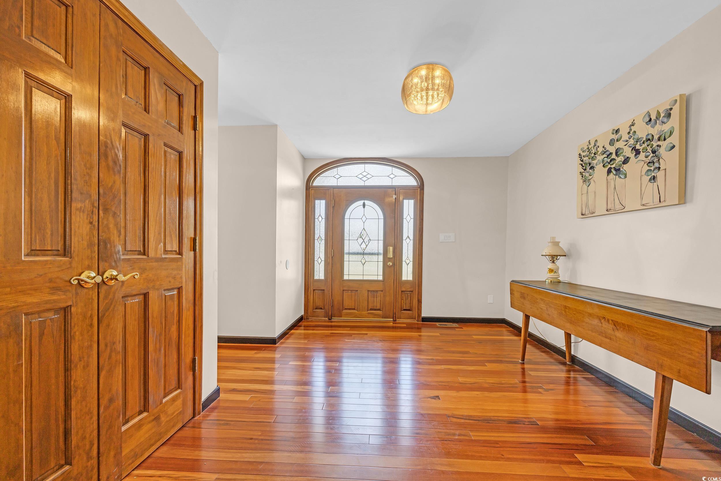 1014 Academy Drive Conway, SC 29526 - Photo 29 of 40 Foyer entrance featuring baseboards and light wood