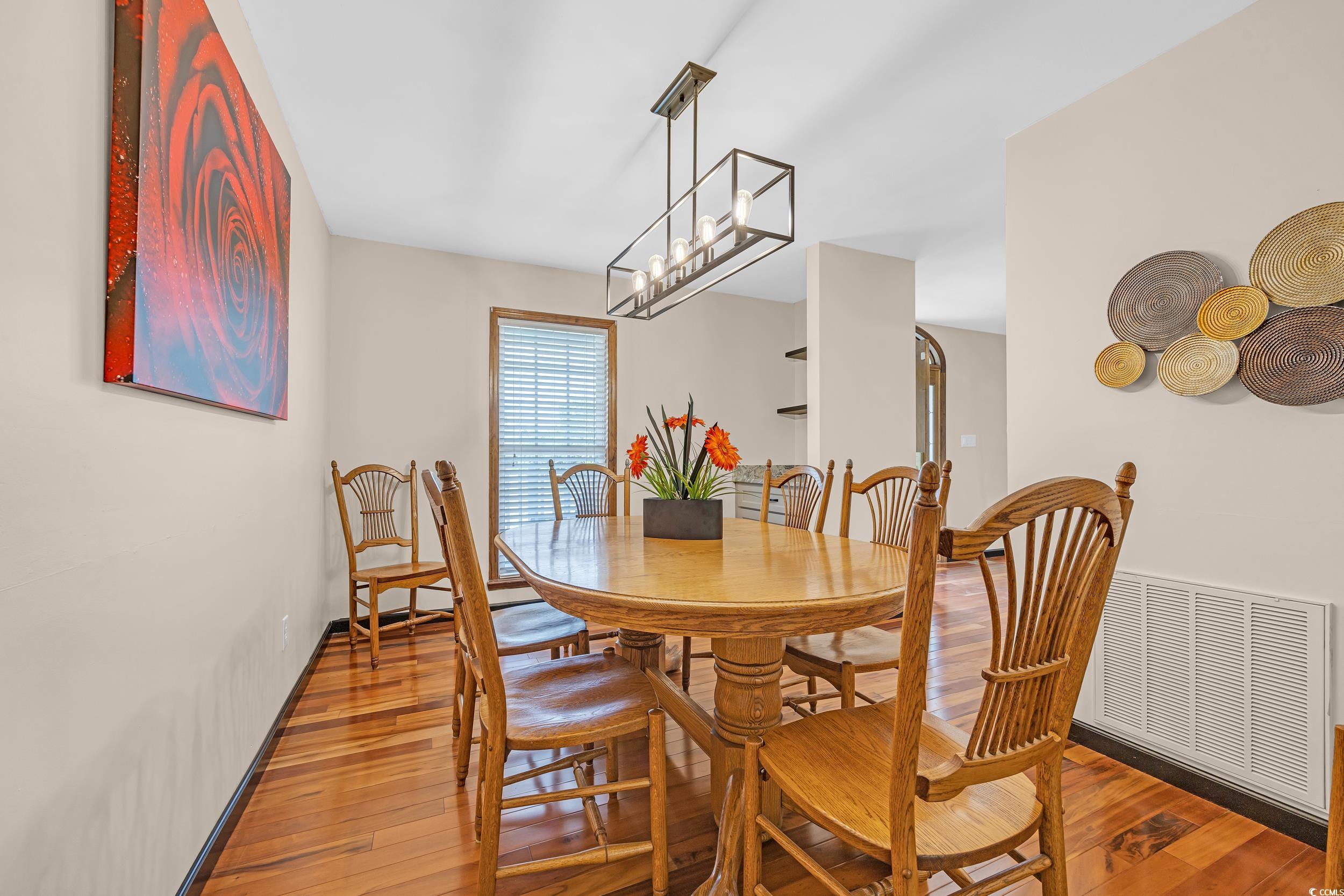 1014 Academy Drive Conway, SC 29526 - Photo 30 of 40 Dining room featuring visible vents, an inviting c