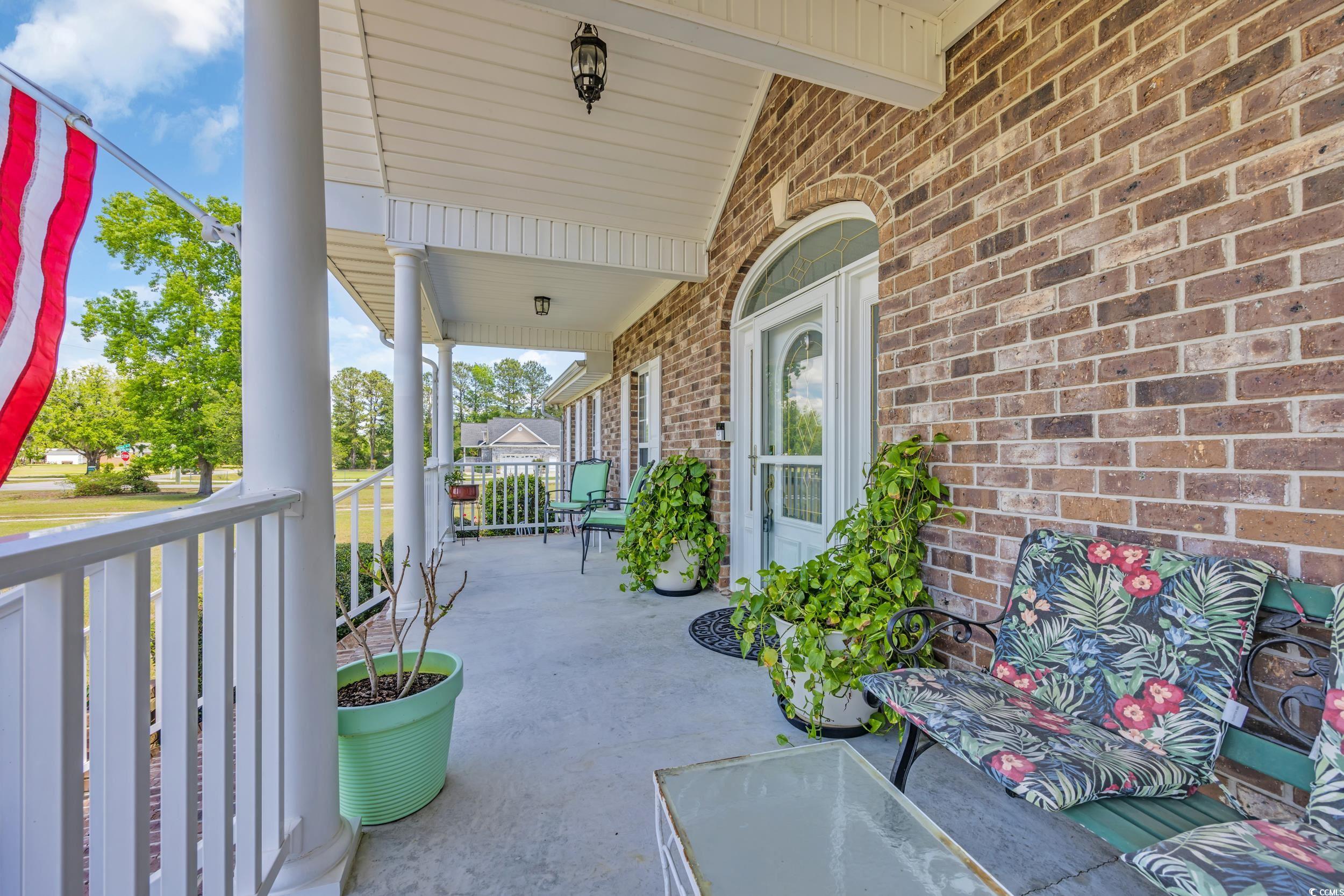 1014 Academy Drive Conway, SC 29526 - Photo 3 of 40 View of patio with a porch