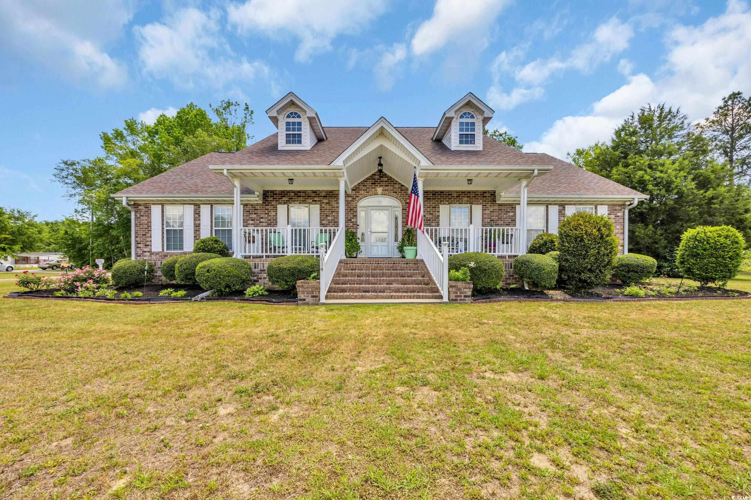 1014 Academy Drive Conway, SC 29526 - Photo 34 of 40 Cape cod-style house with brick siding, a shingled