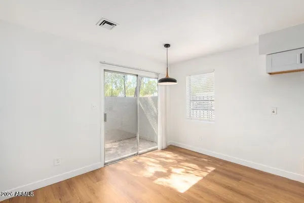 a view of an empty room and window