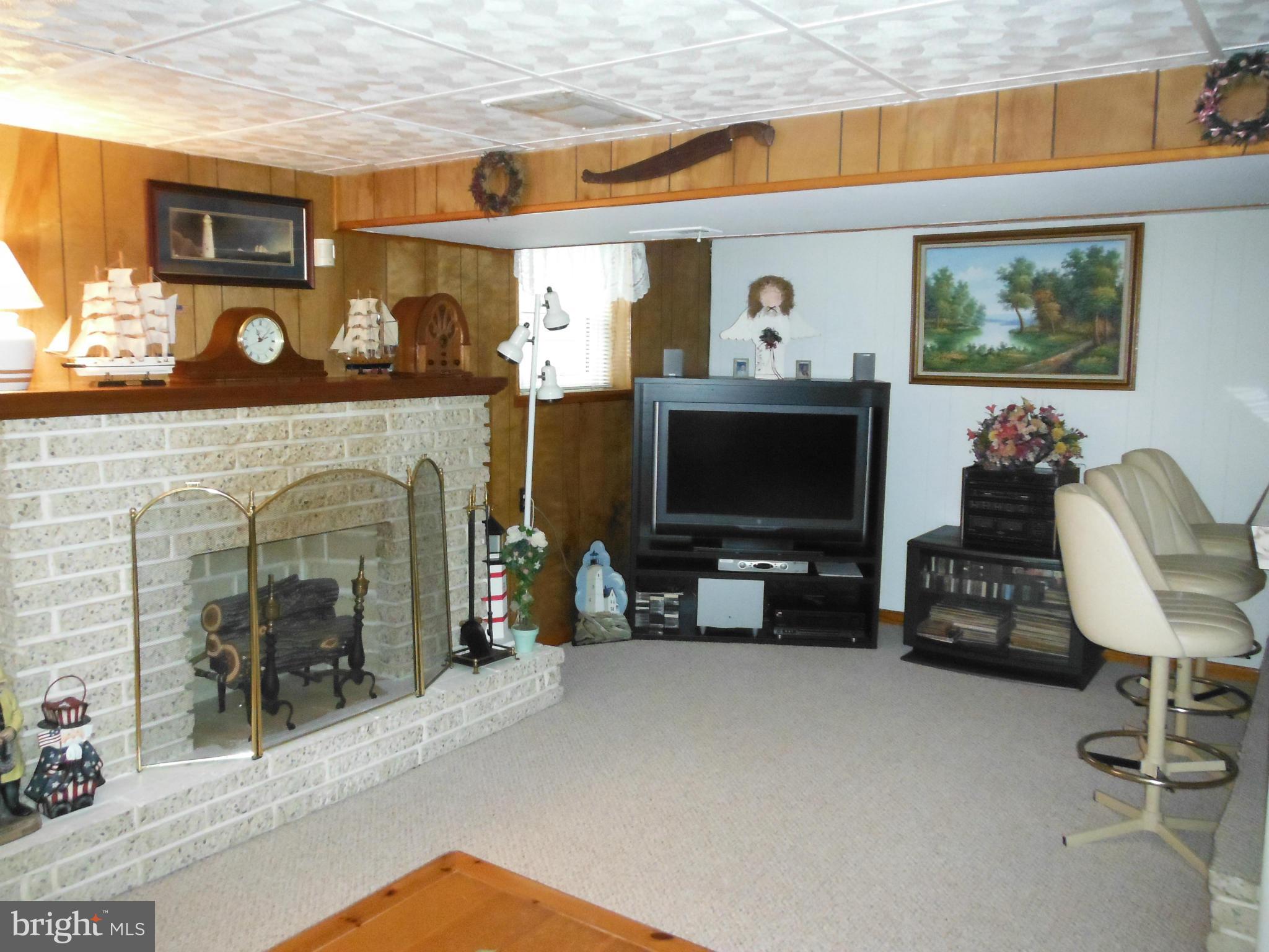 504 Nollmeyer Road Baltimore, MD 21220 - Photo 11 of 23 Lower Level Rec Rm w/Fireplace