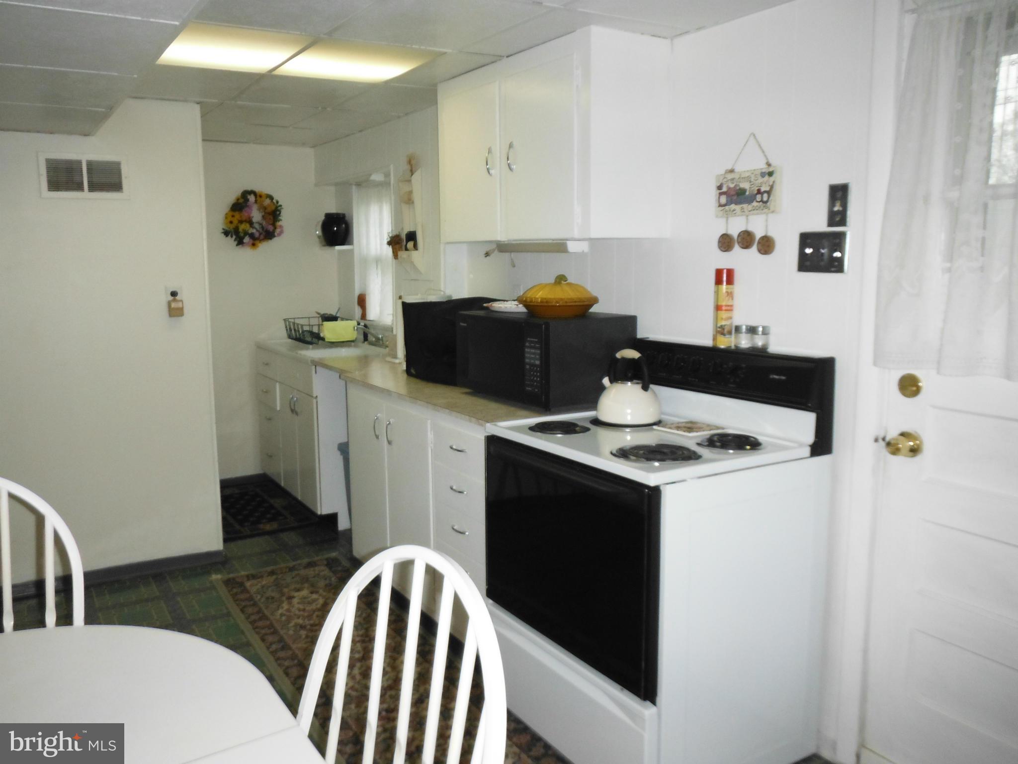 504 Nollmeyer Road Baltimore, MD 21220 - Photo 16 of 23 In-Law Kitchen in Lower Level